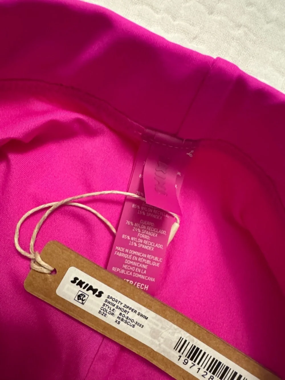 SKIMS Hibiscus (Pink) Sporty Zipper Swim Shorts - Picture 2 of 8
